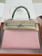 Hermes Kelly 25 Togo Handbags in Mauve Sylvest