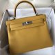 Hermes Kelly 25 Togo Handbags in Jaune Ambre