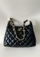 chanel 24A hobo bag black shiny lambskin gold hardware large