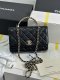 chanel 24a rhinestone handle woc black shiny lambskin gold hardware