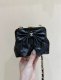 chanel 24a Bow Clip bag black shiny lambskin gold hardware